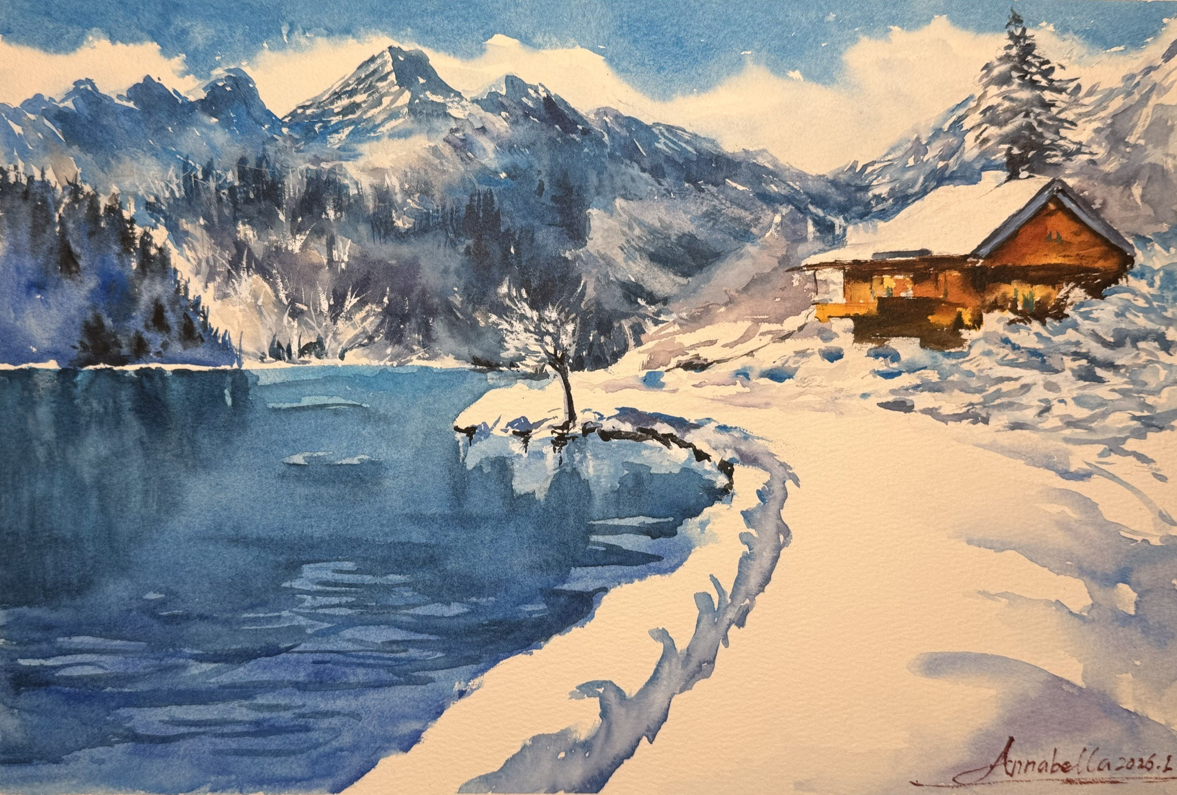 A snowy lakeside cabin beneath blue mountains, reflected in still water.